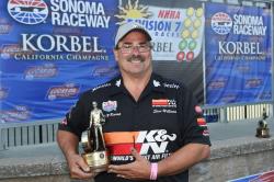 Steve posing with his trophy after a win in Sonoma, Calif., on July 22