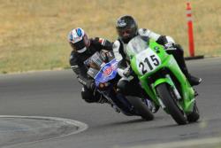 Akkaya guides a student into a turn at Superbike-Coach