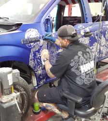 It took Hank Robinson over 800-hrs to engrave all of the images on his 2016 F-150 Freedom Blues 