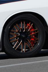 The orange trim on the wheels is very close to the orange in the K&N logo