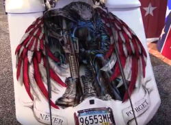Eagle artwork on Fallen Hero custom Harley at the SEMA show