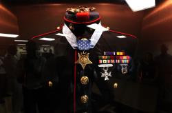 Jason Dunham's uniform on display on the USS Jason Dunham
