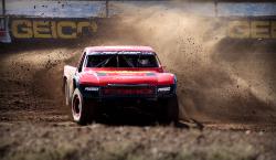 Greg Adler drifting his Pro4 race truck in the Lucas Oil Off Road Racing Series