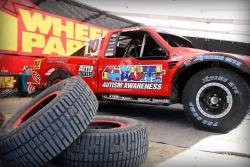 Greg Adler's Pro4 race truck in the Lucas Oil Off Road Racing Series featuring Autism Awareness