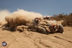Shot of the Murray Brothers on course in Baja, California, deep in silt.