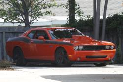 2010 Orange Dodge Challenger with Cowl Hood