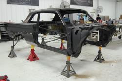 1961 Oldsmobile F-85 with floor removed readied for the reassembly process