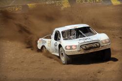 Eric Barron racing during the 2016 Lucas Oil Offroad Racing Series in his Pro 4 kicking up some dust