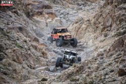 Photo of Jessi Combs in her SAVVY Off Road Ultra4 car chasing down some trail traffic