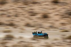 Photo of "Brocky" running flat out in the open desert