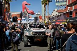 Photo of Nicole and Tom heading down Fremont Street in Old Town Las Vegas with 1000s of onlookers
