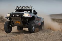 Photo of Total Chaos in the Toyota Tacoma killing it on Lap 1