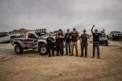 Photo of Team Total Chaos in front of "Lil T" just before the Mint 400 race in Primm, Neva