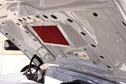 A K&N panel filter from a ZR1 Corvette is utilized to best fit the available space