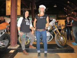 Jessi Combs and Theresa Contreras with their R nine T custom at the Handbuilt Motorcycle Show 