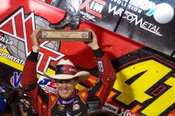 Jason claims the winner's trophy for his victory in the Devil's Bowl at the Texas Outlaw Nat