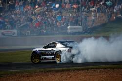 K&N-sponsored Chelsea Denofa drifting in front of a packed house at Road Atlanta