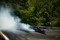 Chelsea Denofa pitches his Ford Mustang RTR hard into the first turn at Formula Drift New Jersey