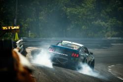 Vaughn Gittin Jr. pitches his Ford Mustang RTR into the first turn at Formula Drift NJ