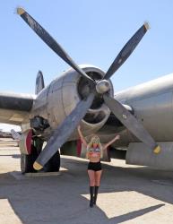 Dennii on location at March Air Reserve Base Museum with airplane