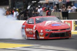 Drew Skillman doing a burnout before a race at the Fallen Patriots NHRA Route 66 Nationals