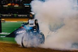 K&N-sponsored Tai Woffinden celebrating a win with a burnout