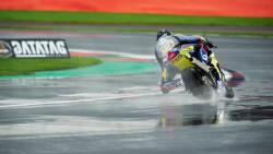 Tommy Bridewell racing in the rain in the British Superbike class
