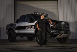 Brad Deberti posing with his latest design: The EAA F-22 Ford Raptor