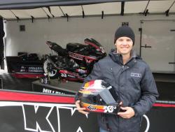 Kyle Wyman holding his K&N race helmet